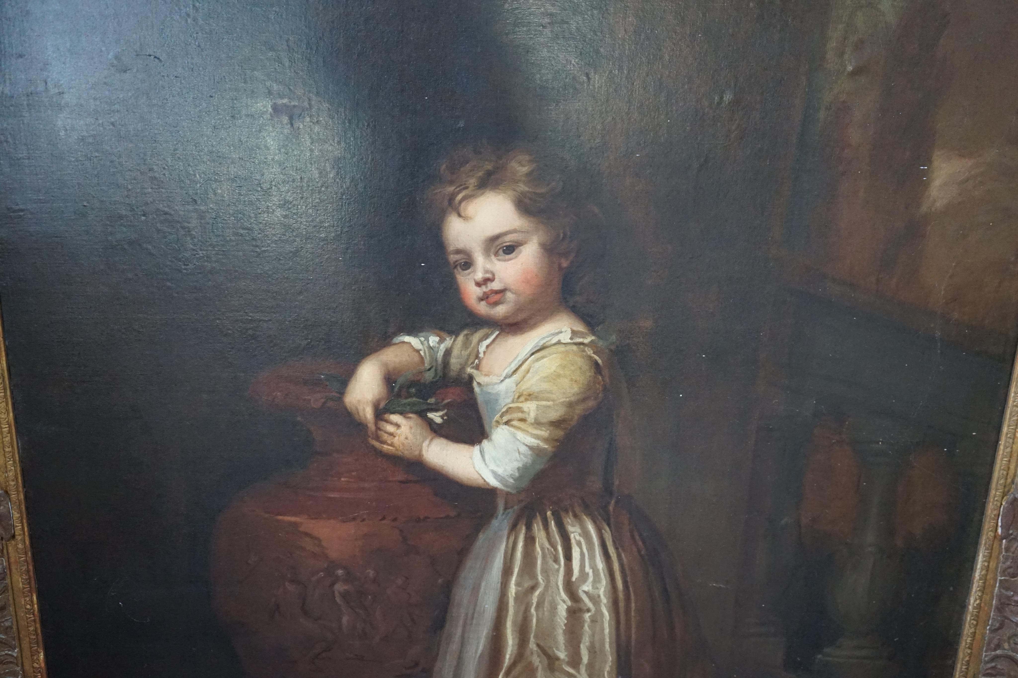 Studio of Sir Godfrey Kneller (1646-1723), Portrait of a child standing full length beside a classical urn, a small dog at her feet, oil on canvas, 126 x 101cm